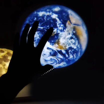 A star projector lamp showing an earth projection on a wall, with its flexible hose bracket allowing adjustable angles.