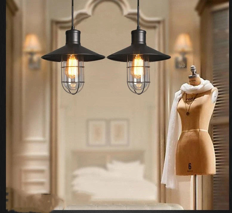 Black iron pendant lamp with cage-style explosion-proof glass shade and adjustable hanging chain