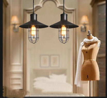 Black iron pendant lamp with cage-style explosion-proof glass shade and adjustable hanging chain