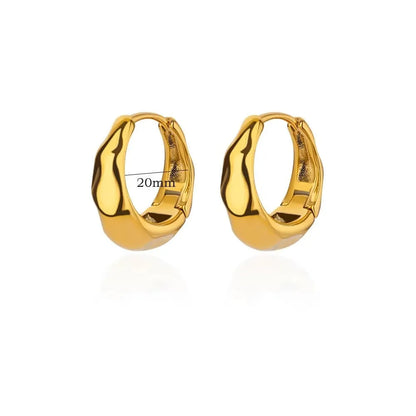 Women's irregular geometric butterfly earrings in copper with diamond treatment, showing heart-shaped and star designs in various colours
