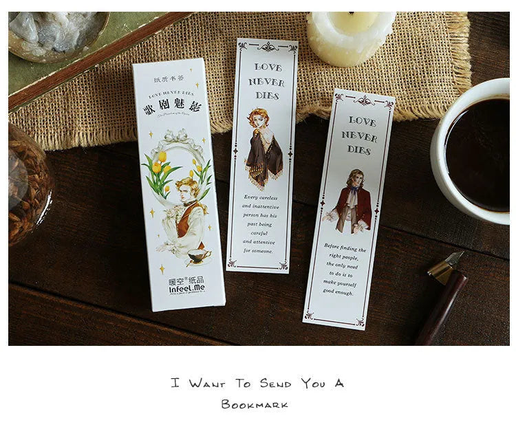 Pack of 30 white cardboard bookmarks with four artistic designs, measuring 40 by 150 millimetres.