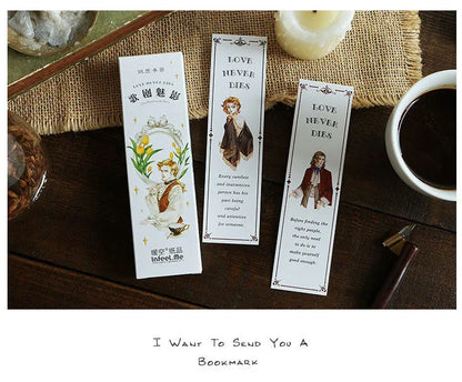 Pack of 30 white cardboard bookmarks with four artistic designs, measuring 40 by 150 millimetres.