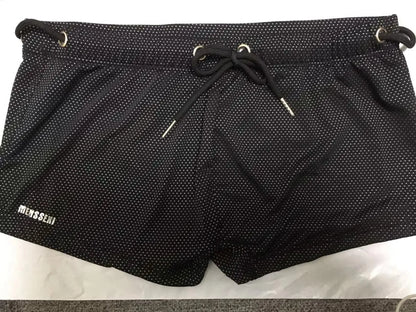 Men's low waist boxer style swimming trunks in nylon, available in multiple solid colours.