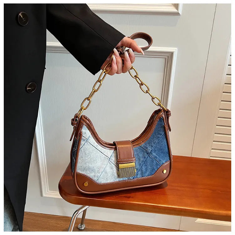 Brown denim women's bucket shoulder bag with diamond mesh detail and chain straps