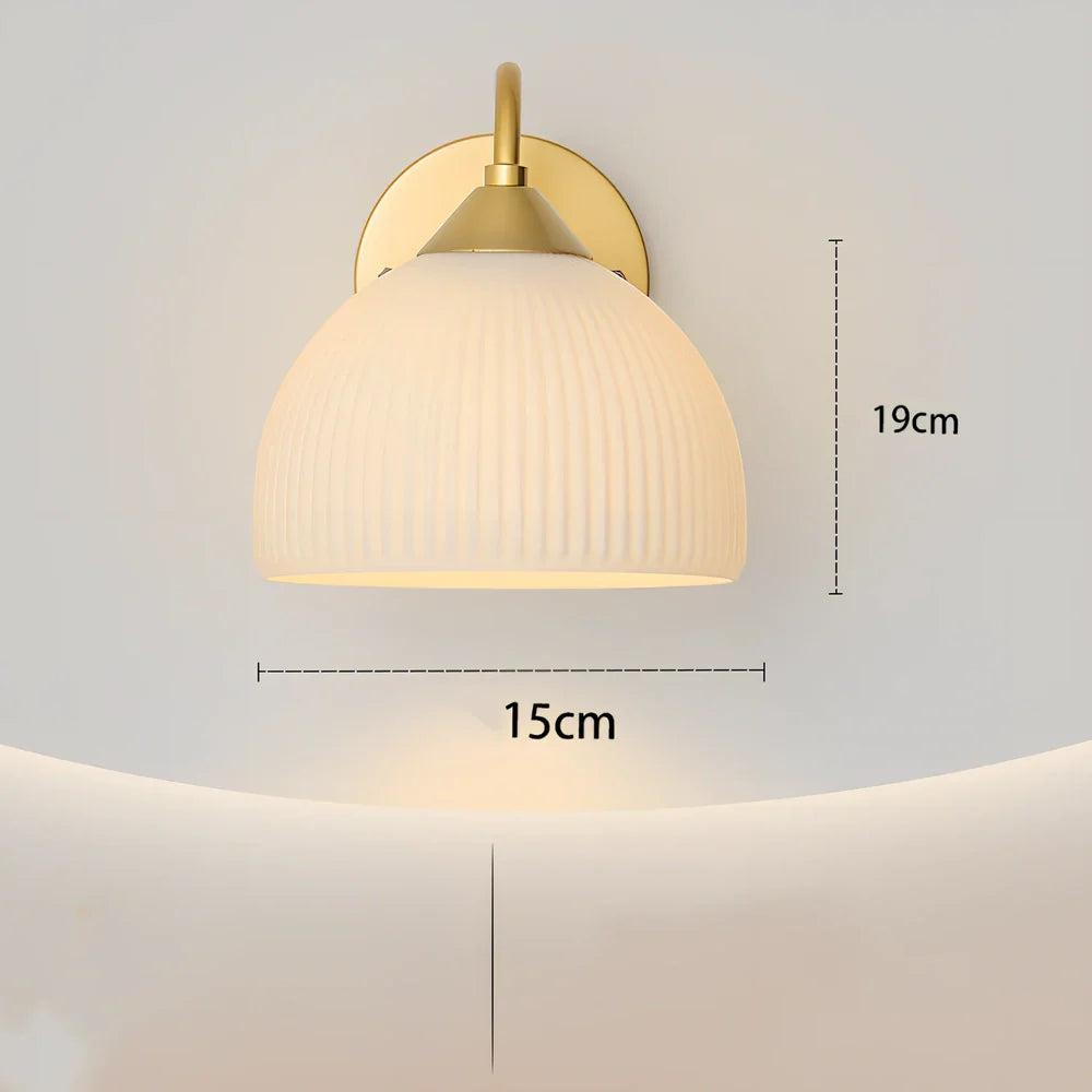 Gold and white postmodern glass table lamp with frosted shade on iron base