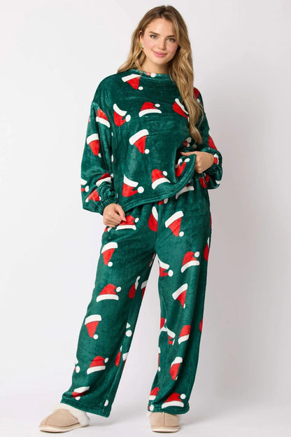 Cozy Christmas-themed flannel pajama sets for women featuring Santa Claus and festive holiday designs