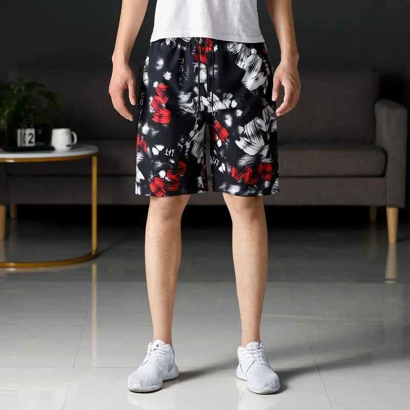 Man wearing loose-fitting striped beach pants made from quick-dry ice silk fabric.