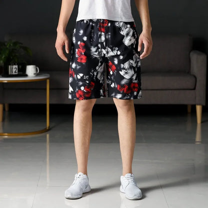 Man wearing loose-fitting striped beach pants made from quick-dry ice silk fabric.