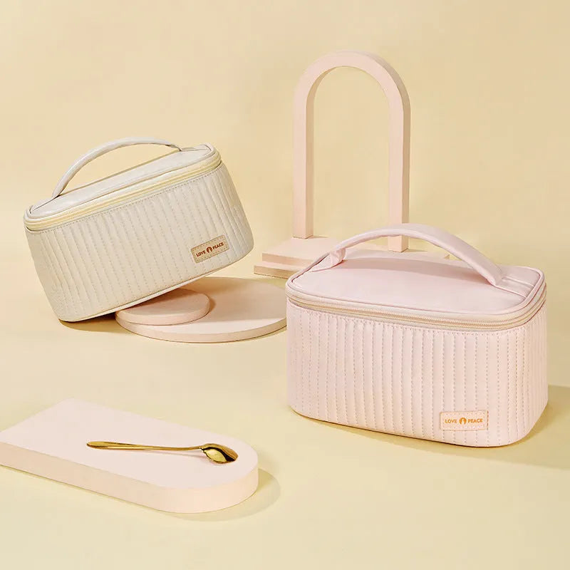 Open-top cake makeup bag in six colour options with PU leather construction and 20cm dimensions