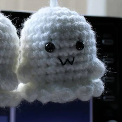 Soft, hand-woven plush car hanging ornament in a cartoon character design.