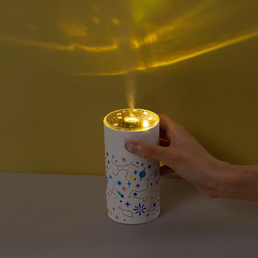 Round plastic star projector humidifier with water tank and USB cable, 67x67x125mm dimensions