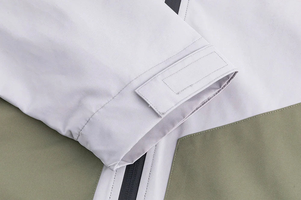 Military Green Assault Suit for outdoor adventures, durable and comfortable with multiple pockets.