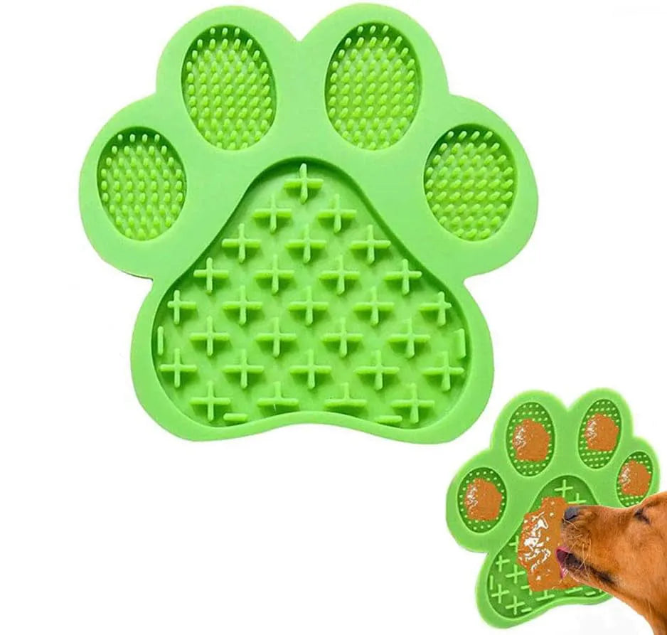 Blue bone-shaped dog licking mat with suction cups on a smooth surface, measuring 18x18cm