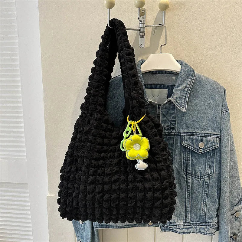 Women's pleated bubble crossbody bag in vertical square shape with pendant accessory
