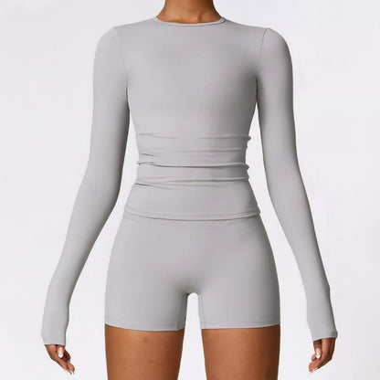 Women's slim long sleeve pullover top for yoga and fitness in various colors