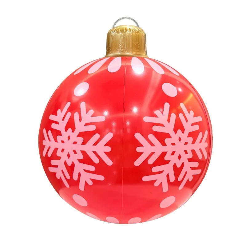 63cm red snowflake inflatable Christmas ball with flashing LED lights hanging in garden