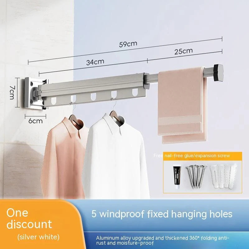 Aluminum retractable drying rack mounted on a window, extending outward for clothes drying