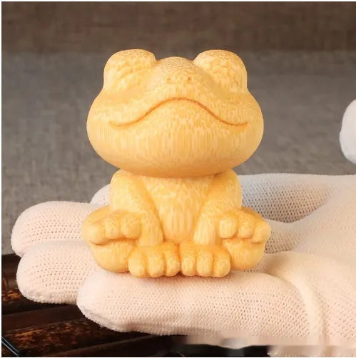 Solid bamboo carving ornament with smiling frog design, 5cm height with 4.5cm diameter, includes oil glove brush