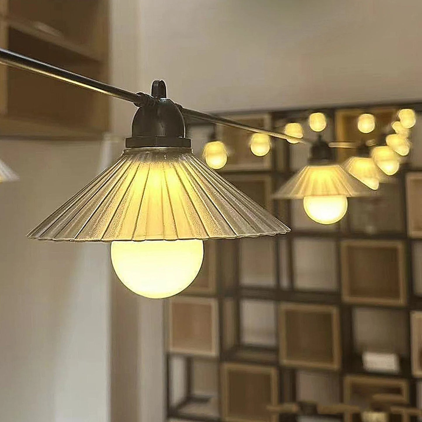 Outdoor LED string lights with flower-shaped bulbs in warm white or multicolour options