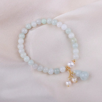 Natural emerald jade bracelet with traditional Chinese gourd design elements for women