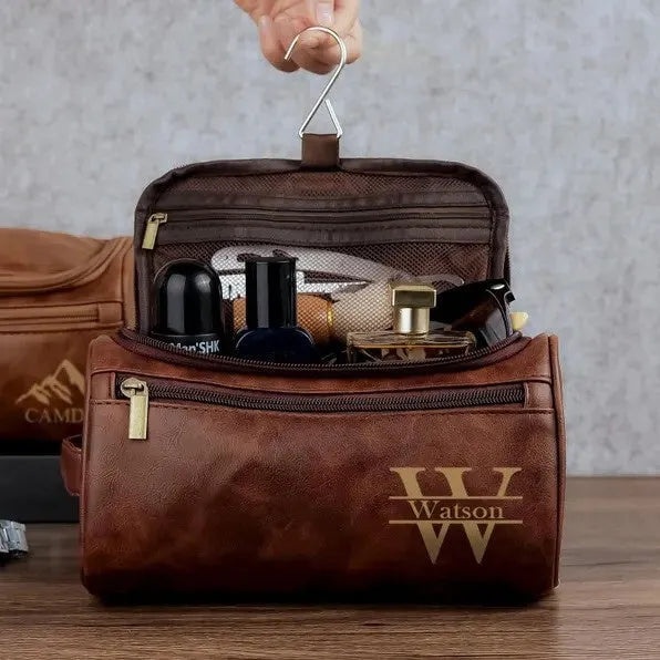 Men's leather-look PU toiletry bag shown in black, brown, dark brown, and light brown colour options.