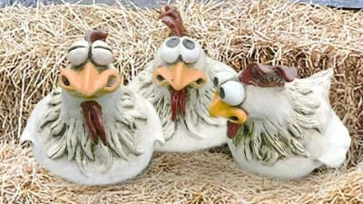 Resin chicken garden statue with vibrant colors and a playful design, perfect for adding charm to outdoor spaces