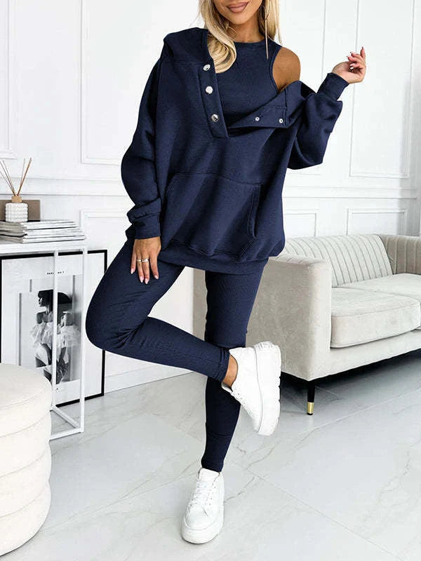 Women's 3-piece sports suit featuring a hooded sweatshirt with pockets and slim trousers
