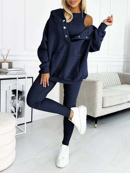 Women's 3-piece sports suit featuring a hooded sweatshirt with pockets and slim trousers