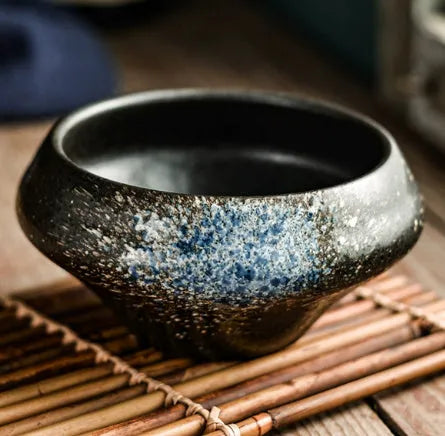 A tall porcelain soup bowl with a Japanese-inspired underglaze pattern, suitable for noodles and microwave use.