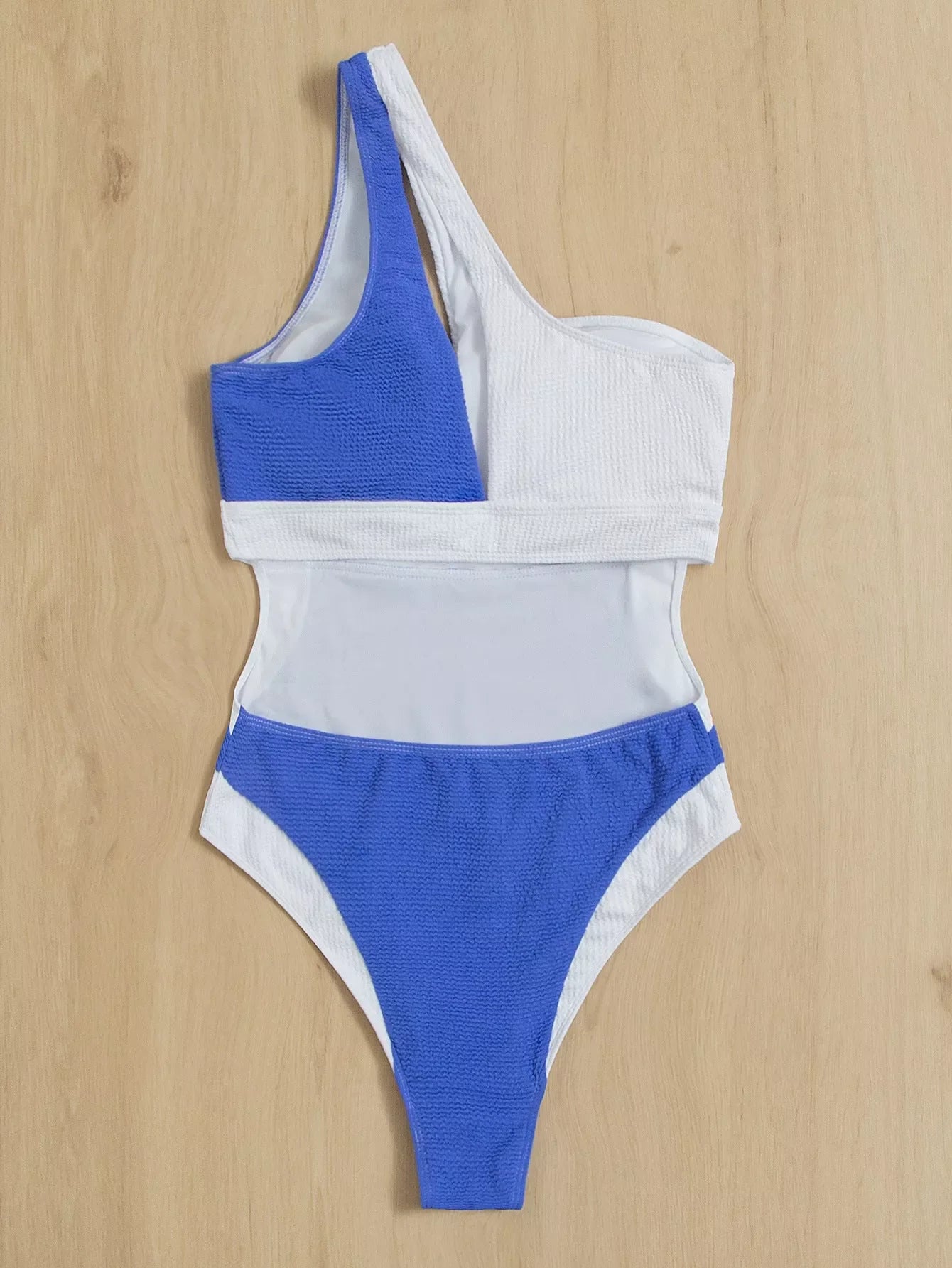 Ladies one piece swimsuit with blue and white colorblock design
