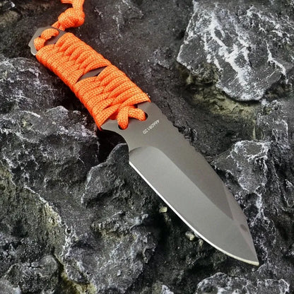 Outdoor survival knife with straight blade, rope-bound handle, and black ABS sheath on grey background