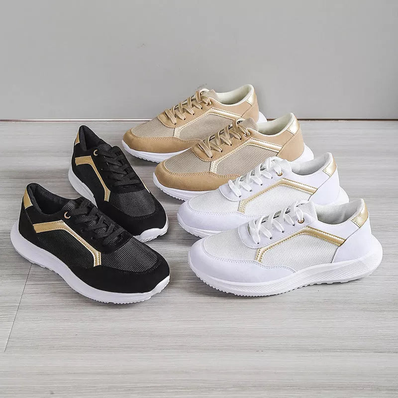 Women's lace-up sports sneakers with breathable mesh upper in black, white, and apricot