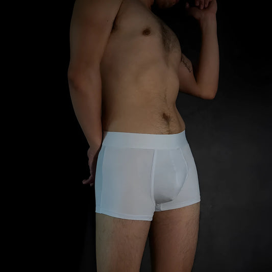 Men's solid colour cotton boxer shorts showing available colours: black, white, silver grey, light green