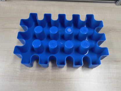 Blue plastic outdoor ice maker tray measuring 34cm long by 22cm wide