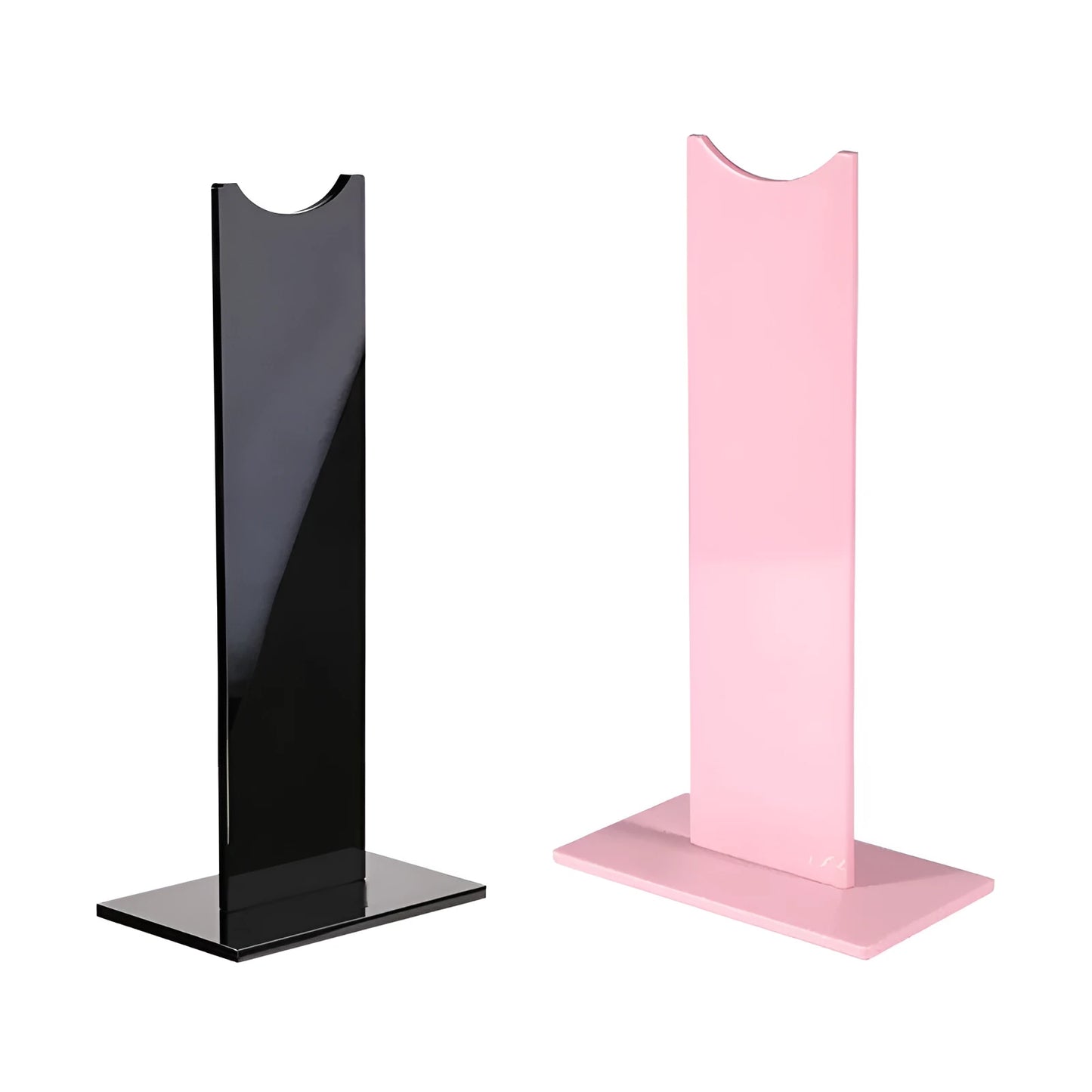 Pink detachable head-mounted gaming headset stand with non-slip silicone base on a desk