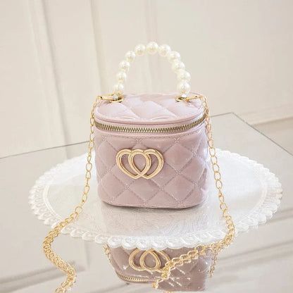 PVC bucket-style gel bag with a heart-shaped pattern, shown in apricot colour.