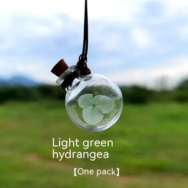 Glass fire extinguisher-shaped car perfume pendant with preserved flowers inside