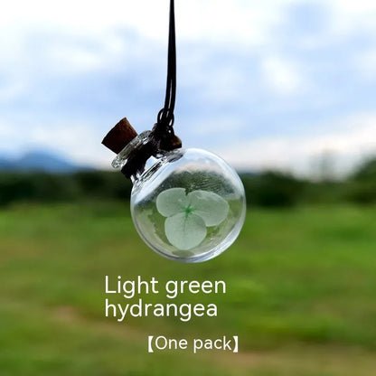 Glass fire extinguisher-shaped car perfume pendant with preserved flowers inside