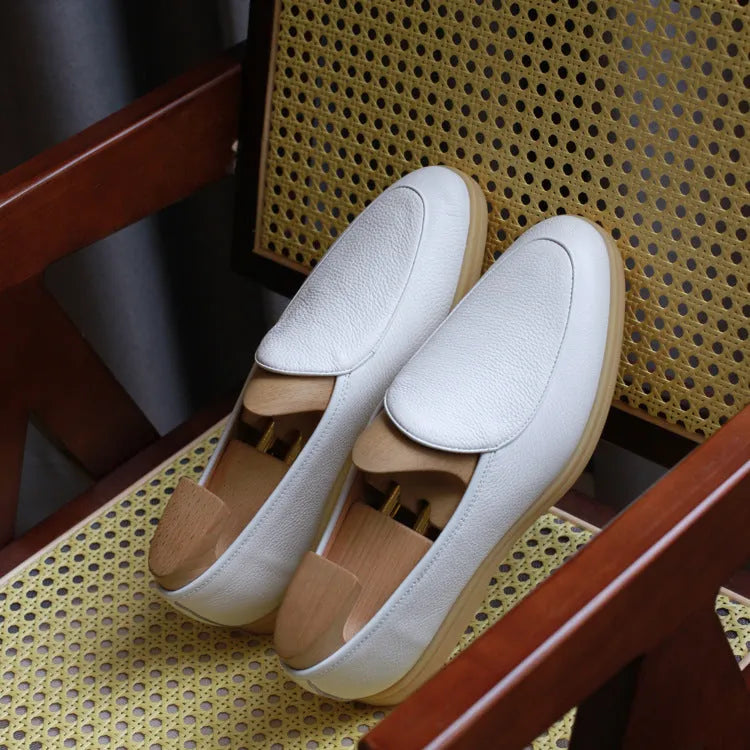 Men's full-grain leather loafers in brown with TPR sole, showing low-tube sock design and classic styling