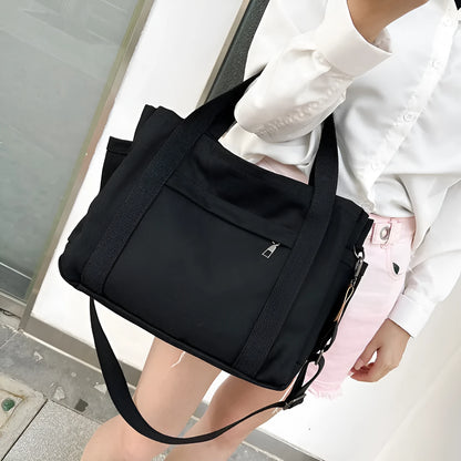Army Green canvas tote bag showing open top with internal laptop pocket and organisers.