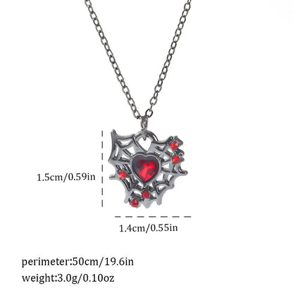 Gothic style zinc alloy necklace with bat pendant on a silver chain against dark background.