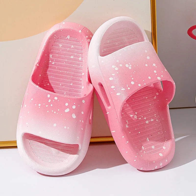 Gradient blue PVC slipper for children on a white background, showing non-slip sole.