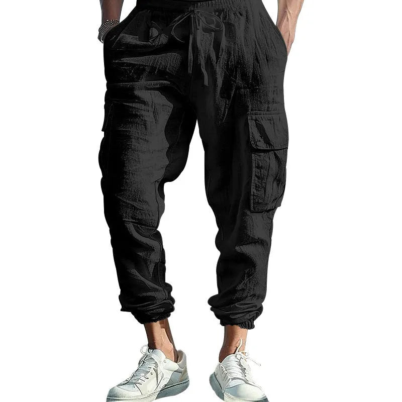 Men's linen trousers with ankle ties and multiple pockets in solid colour