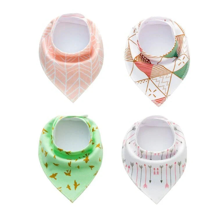 Stylish baby bibs and burp cloths featuring trendy arrow, wave, and triangle designs in soft, absorbent cotton