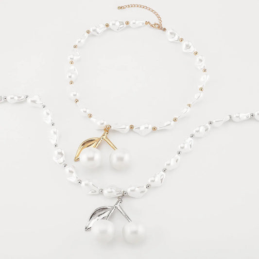 Adjustable 51-60cm alloy necklace with cherry fruit pendant and imitation pearls in gold or white K electroplated finish