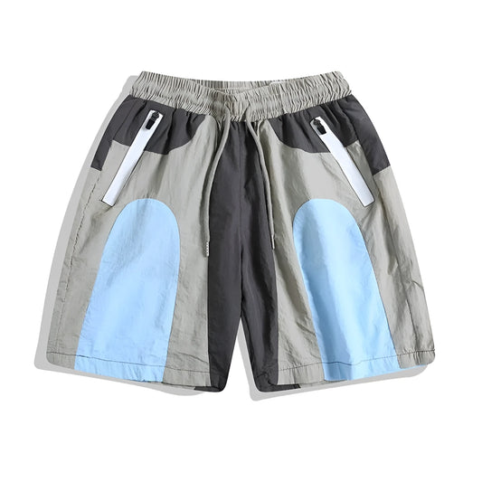 Men's blue patchwork quick-drying sports shorts with elastic waistband and straight-leg design