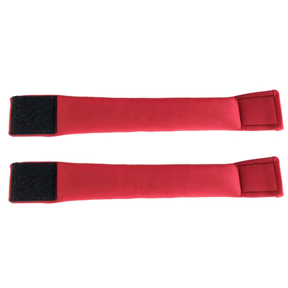 Red neoprene weight-bearing sandbags with reinforced stitching for strength training