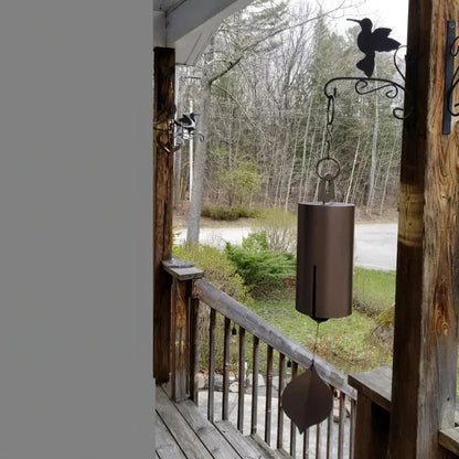 Melodious Metal Wind Chimes in various sizes and colors, featuring a sleek and minimalist design for elegant garden decor