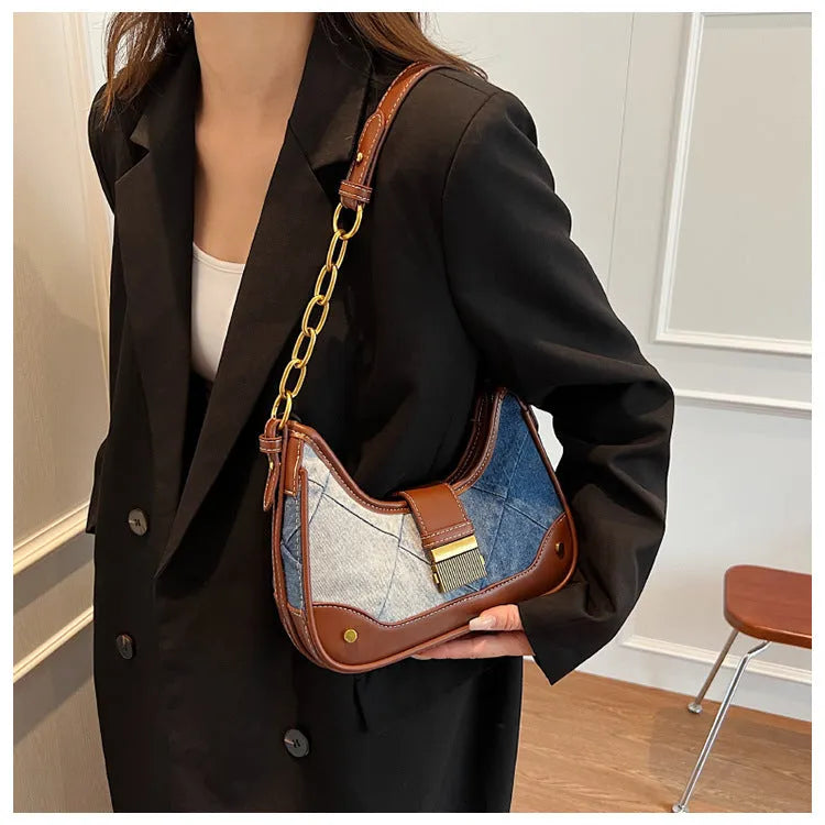 Brown denim women's bucket shoulder bag with diamond mesh detail and chain straps
