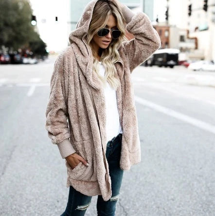 A cozy, plush women's jacket in a variety of colors with a relaxed, oversized fit for easy layering